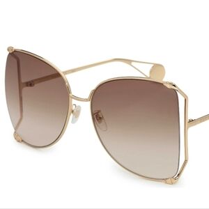 Gucci Elegant Gold Sunglasses